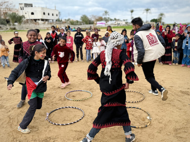 Children playing in a circle in Gaza