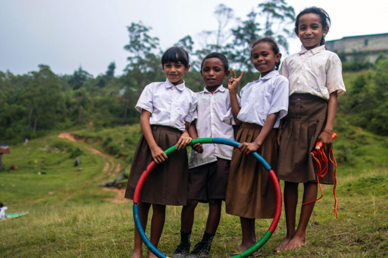 Girls playing outside in Timor-Leste