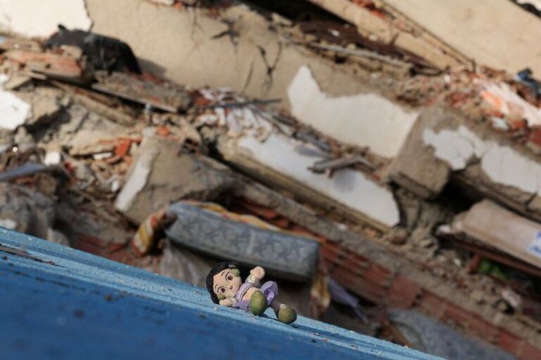 A child's toy and debris in the aftermath of earthquakes, in La Guaira, Venezuela, July 1, 2026.