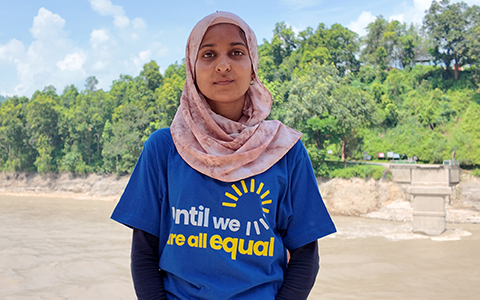 Promo image showing a young girl looking determined and hopeful for her safety