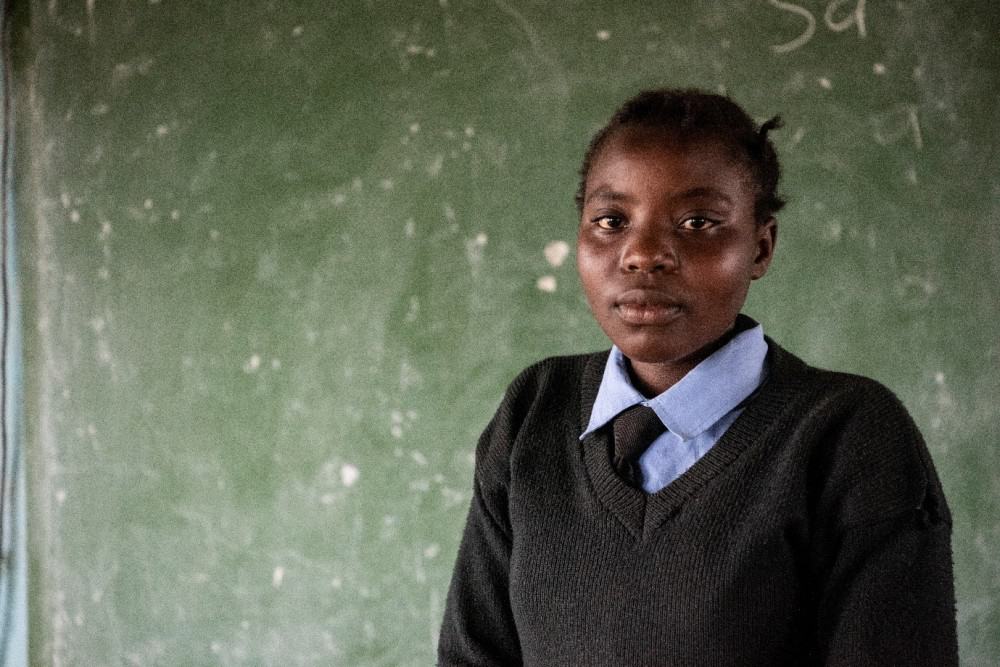 Samira, a teenage girl in Zambia, is one of 15 million people in southern Africa facing food shortages resulting from drought and flooding, signs of climate change