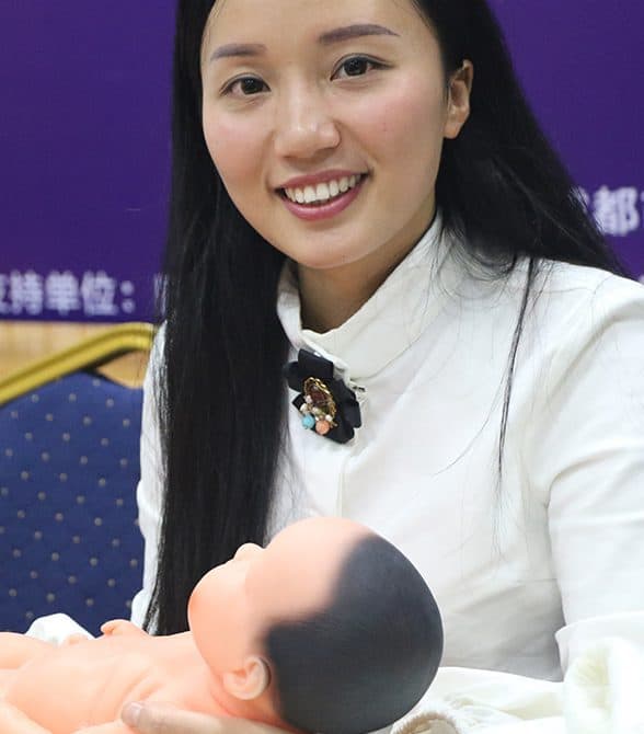 Sponsored Girl in China in infant care training