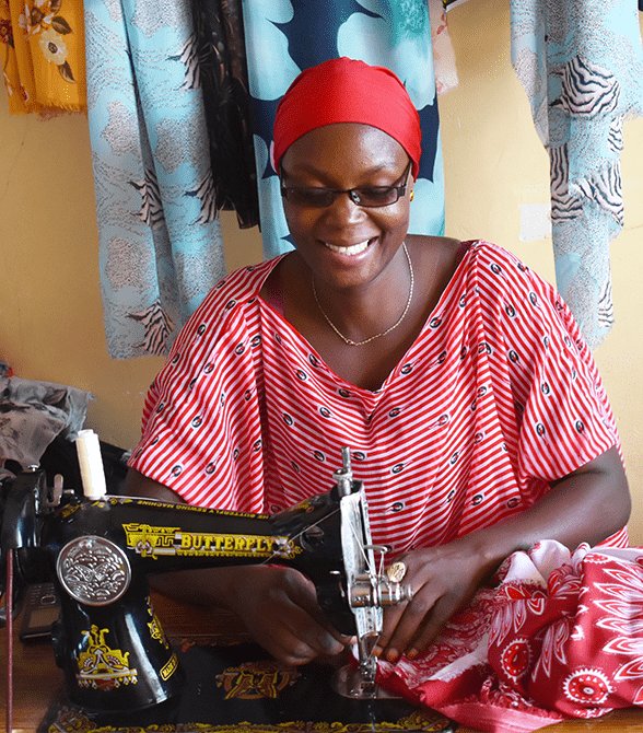Mwajuma Sewing As A Part of Plans Youth Economic Empowerment Project