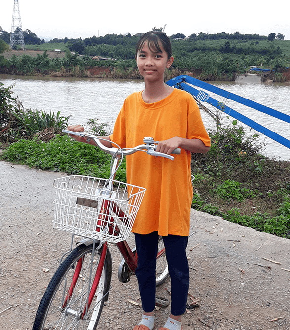 Sponsored Girl In Vietnam Li Na Riding Bike To School