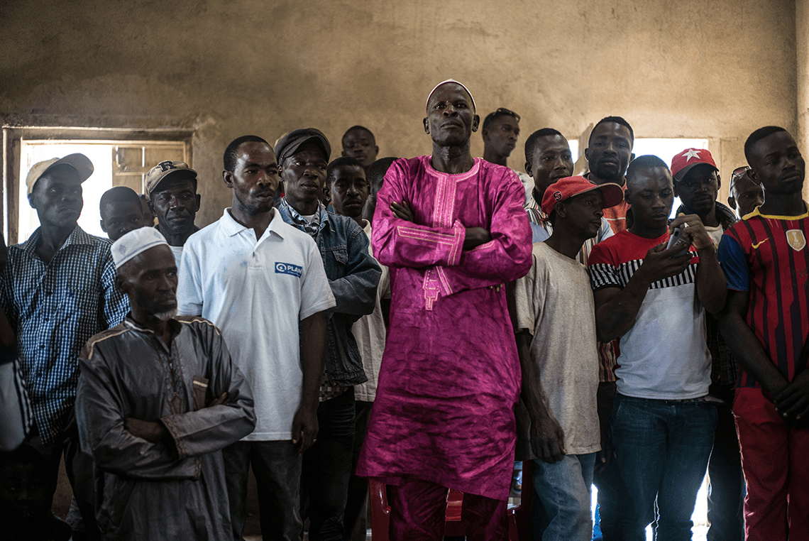 Men Wait To Celebrate