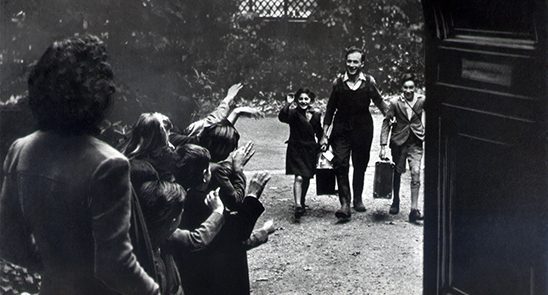 Eric Muggeridge bringing two new children to Woodbury Down Sanctuary in London in 1936