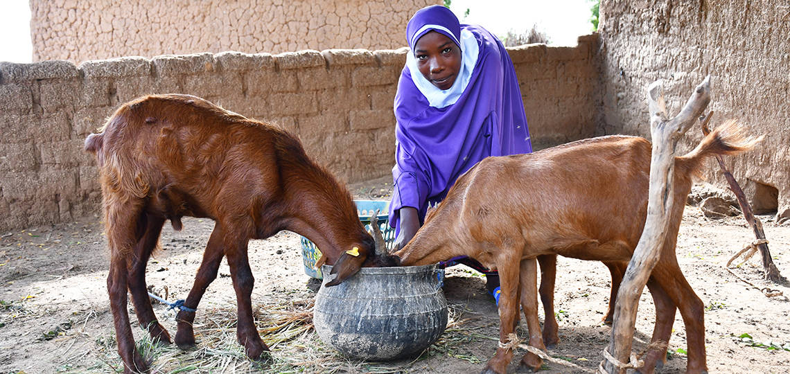 Woman with goats