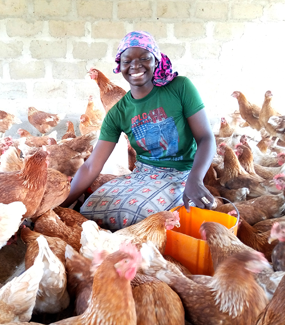 Former Sponsored Child With Chickens