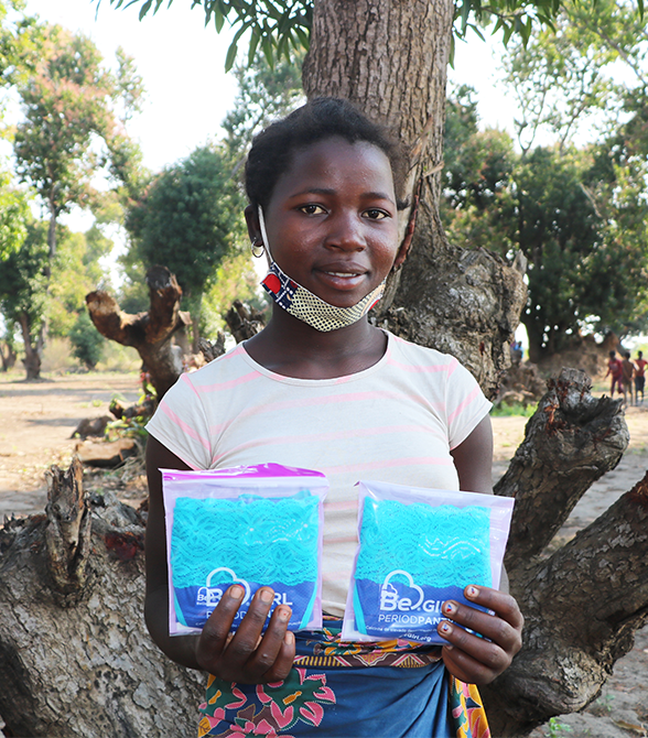 Girl Receiving Plan Humanitarian Aid