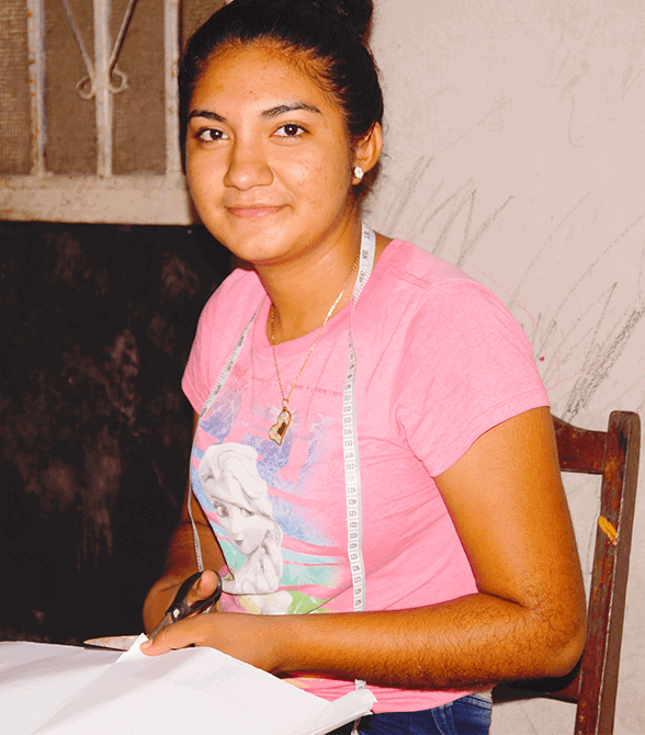 Sponsored Child In Honduras Sewing