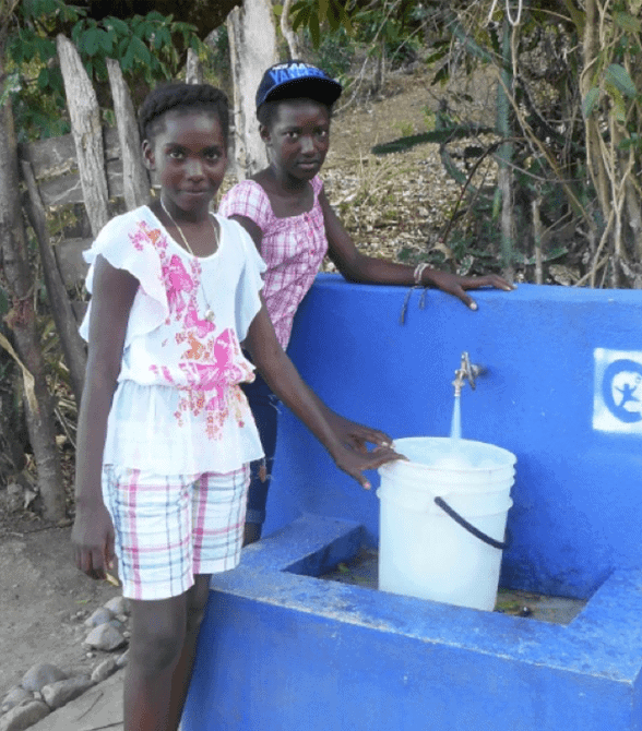 Sponsored Girls In Haiti School Collecting Water