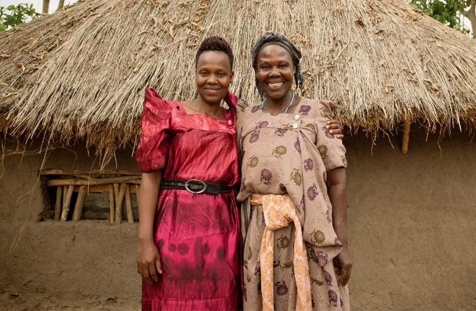 Mother and Daughter Outside Their Home