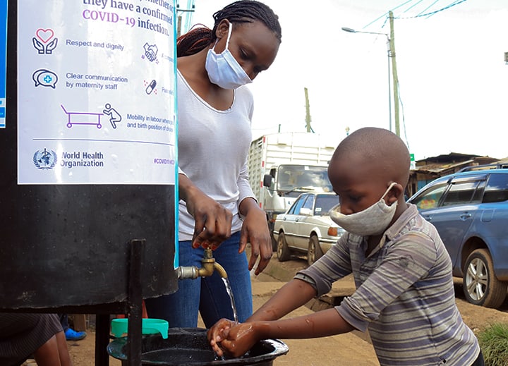 Mom And Son Washing Hands