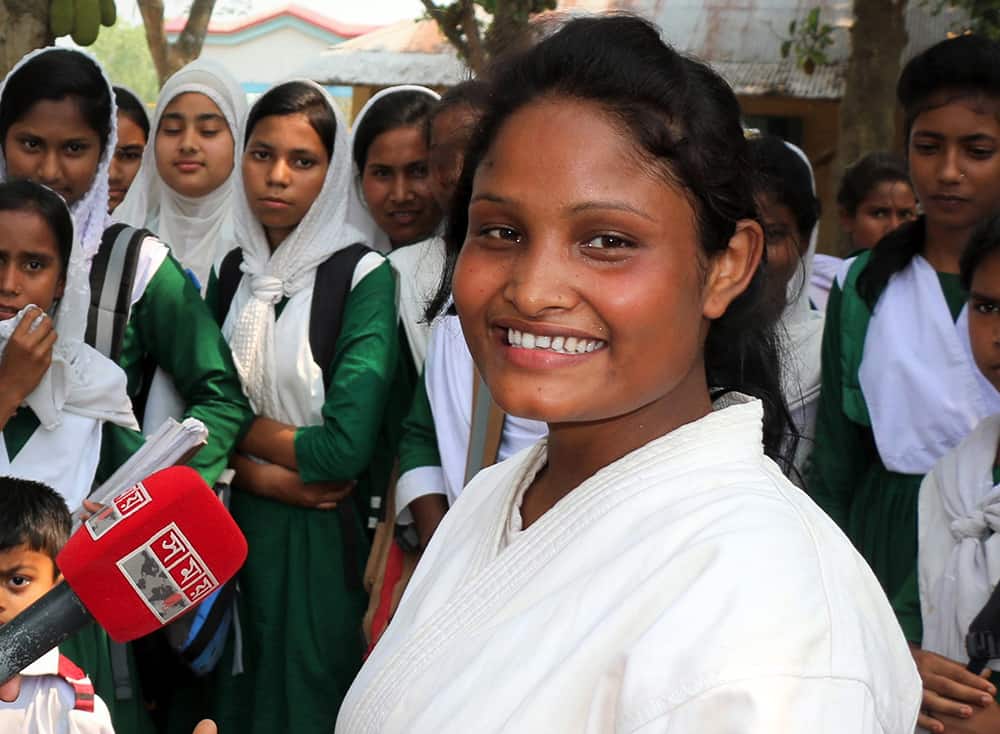 Gaitree, 23, interviewed about her martial arts for television