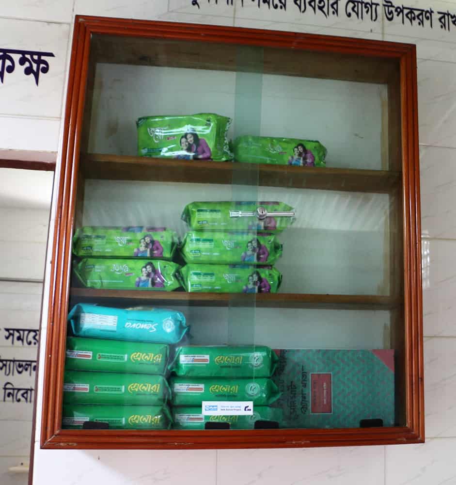 Girls at a school in Bangladesh lobbied to install this “SaniMart,” an enclosed shelf from which girls can easily purchase menstrual pads. 