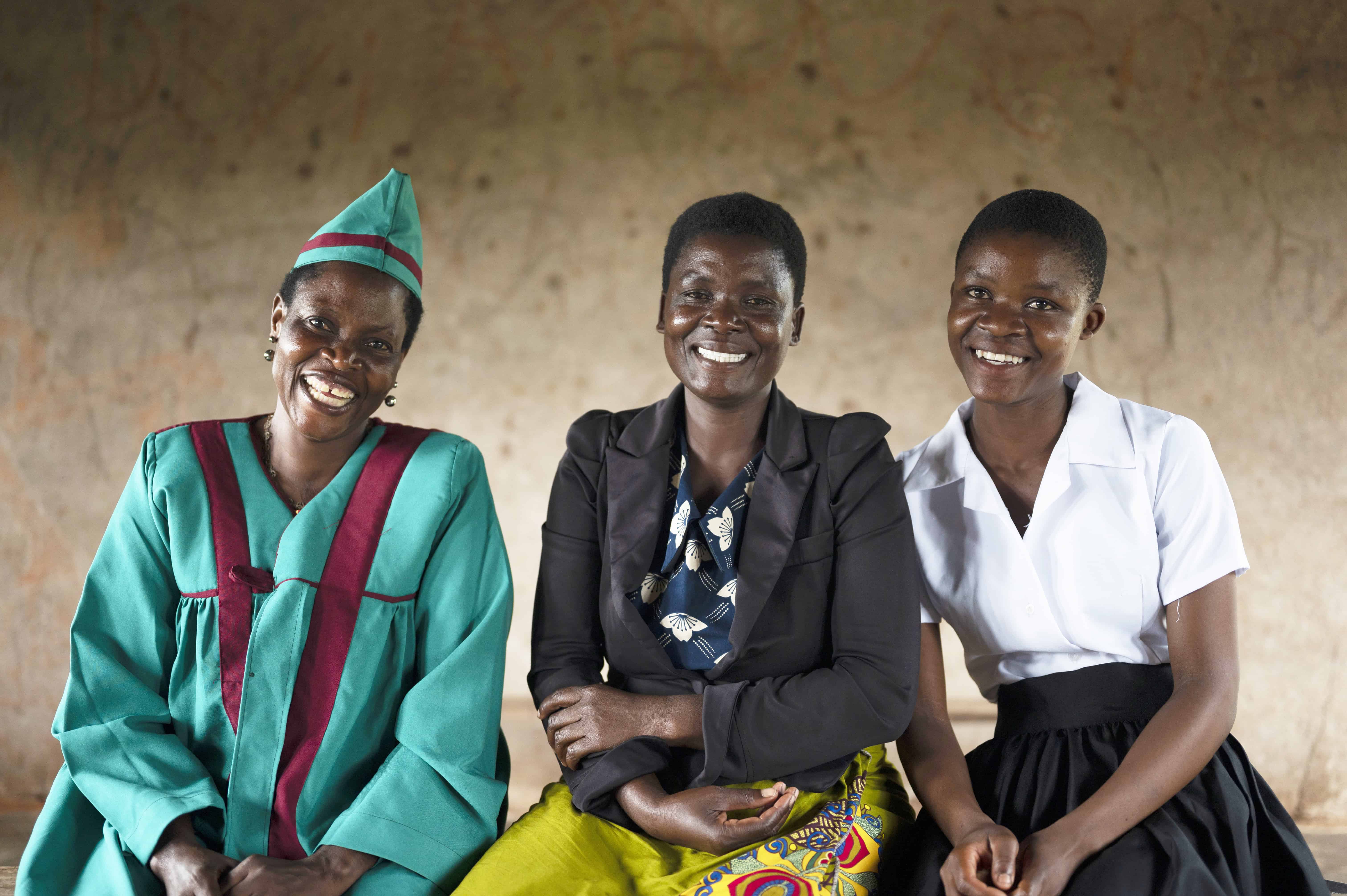 With Chief Kukada’s support, Bertha broke free from her marriage and is back in school. Her mother (center) is supporting her as she continues her education. 