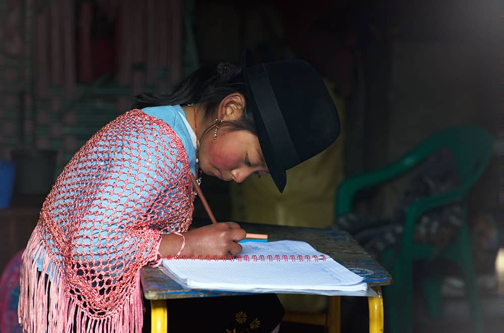 In her notebook, Evelyn keeps a list of her goals. She hopes there will be more opportunities for children in her community in the future and says that she will try to ensure that there are.