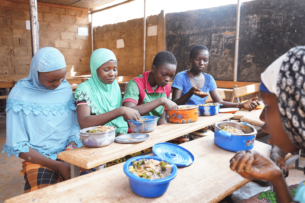 Four girls eat their lunch together at the school’s canteen.