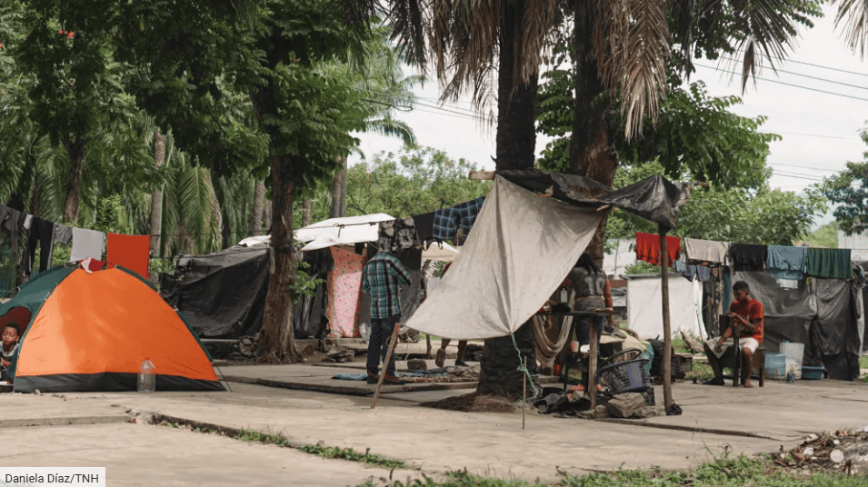 Migrants camped under makeshift shelters during the migration crisis in Tapachula, Mexico.