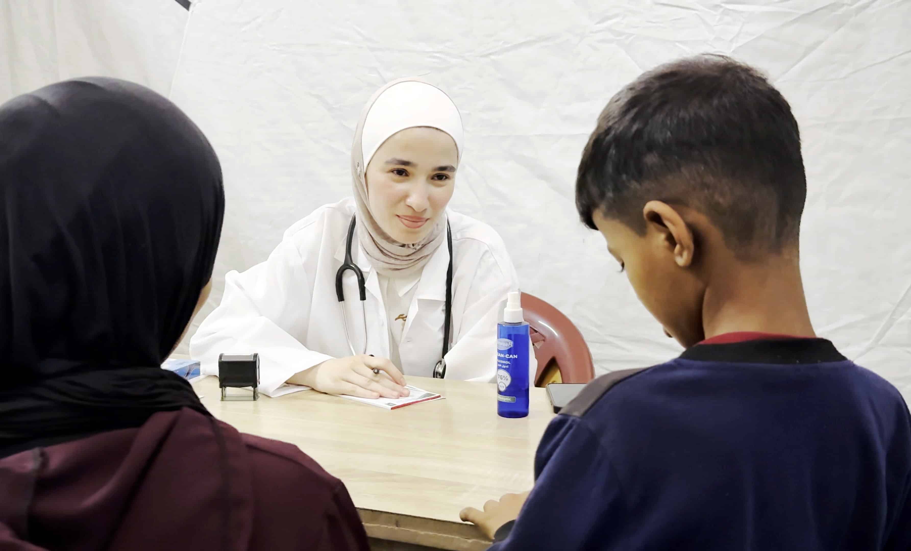 Dr. Walaa Wissam Abu Samra tends to children in Gaza’s overcrowded hospitals despite extreme shortages.