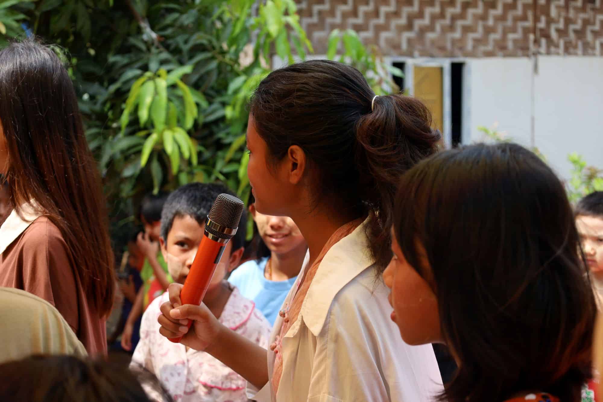 Nan, Myanmar volunteer with children