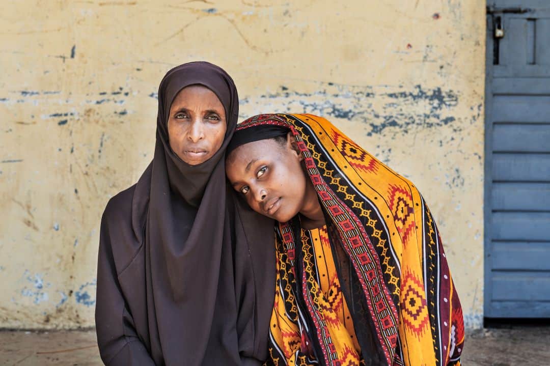Mother and daughter in Ethiopia standing against harmful traditions
