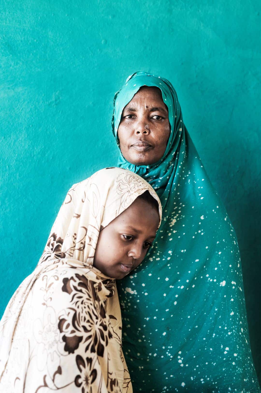 Mother and daughter in Ethiopia standing against harmful traditions